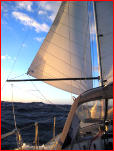 Even running before the wind will cause salt crystals to attach to your sails. This can chafe sail thread. Fresh water wash sails at the fist opportunity. Dry, bag, and stow them below.